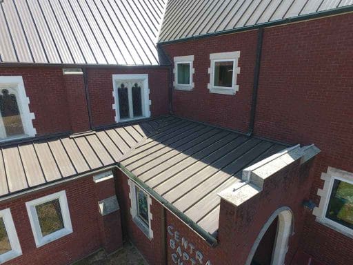 new beige standing seam metal roofing in Nashville, AR Hostetler roofing